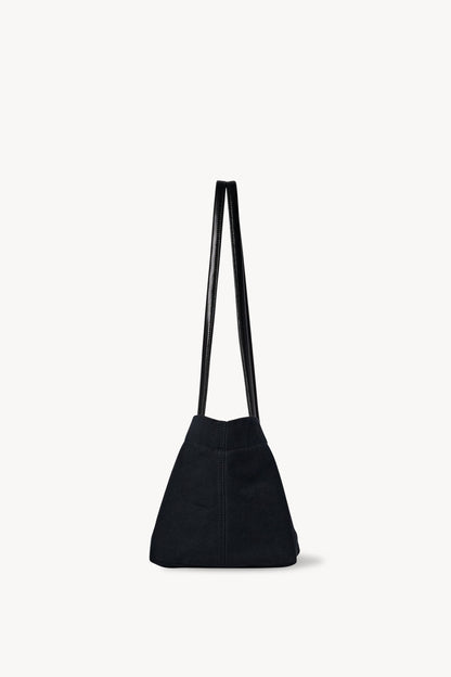 The Row Idaho Shoulder Bag in Black, side view — The Quiet Edition