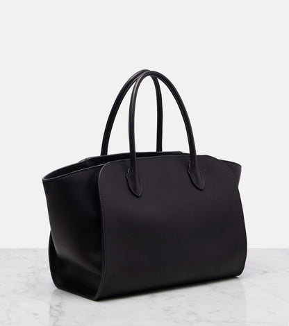 The Row Marlo 12 Leather Tote Bag in Black, angle — The Quiet Edition