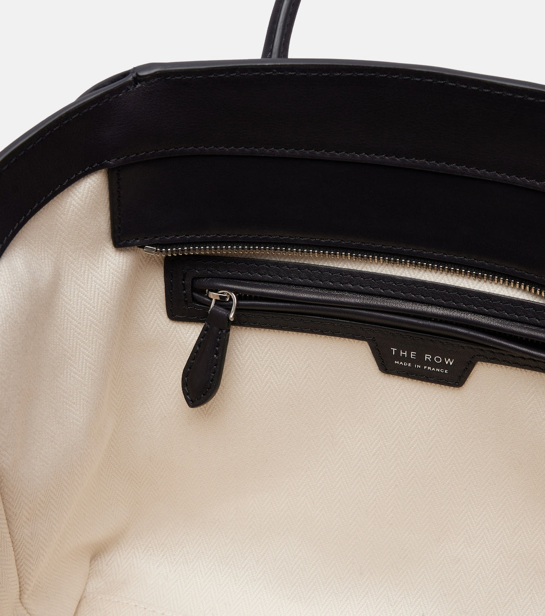 The Row Marlo 12 Leather Tote Bag in Black, side — The Quiet Edition
