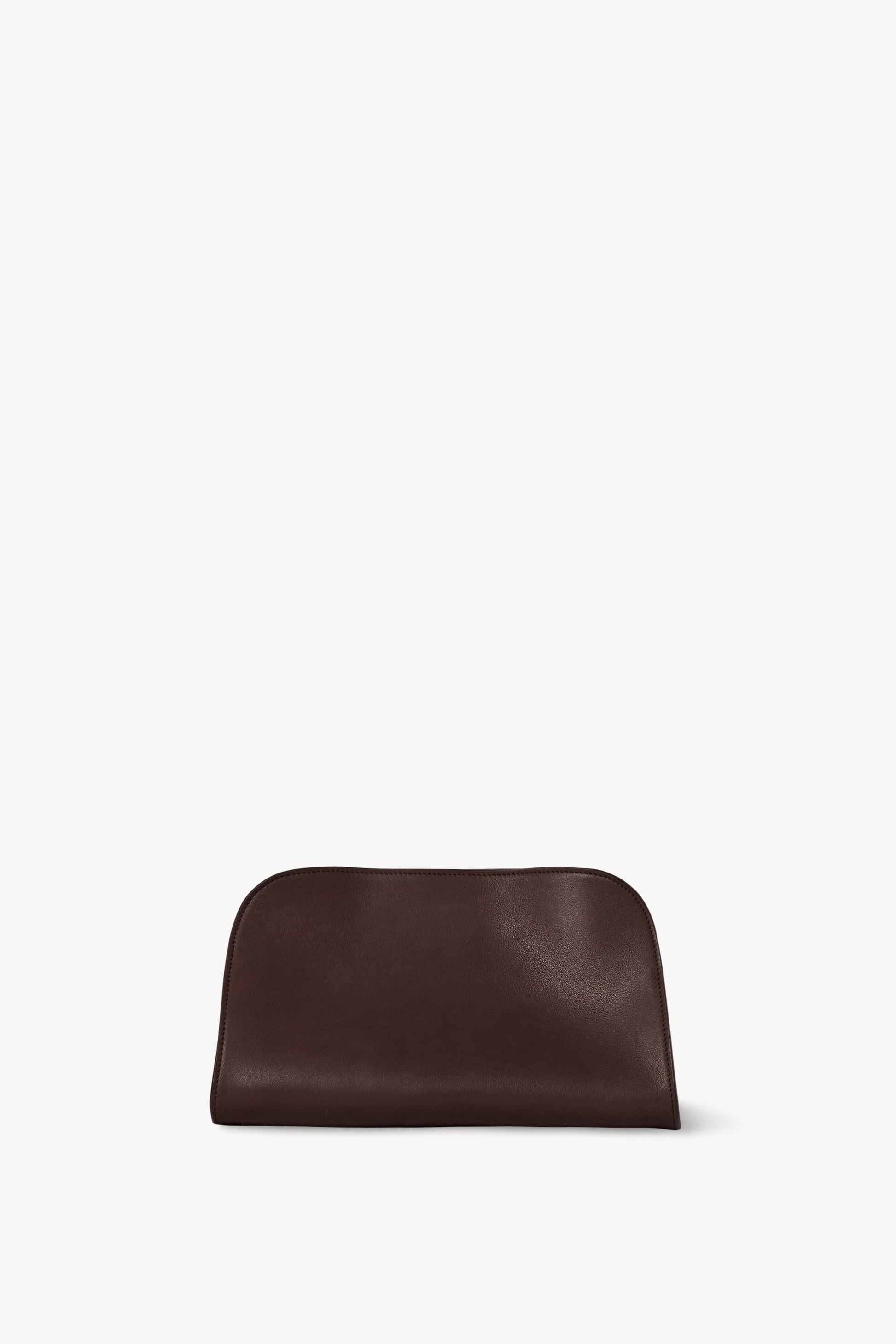 The Row Peggy Clutch in Burgundy, front — The Quiet Edition