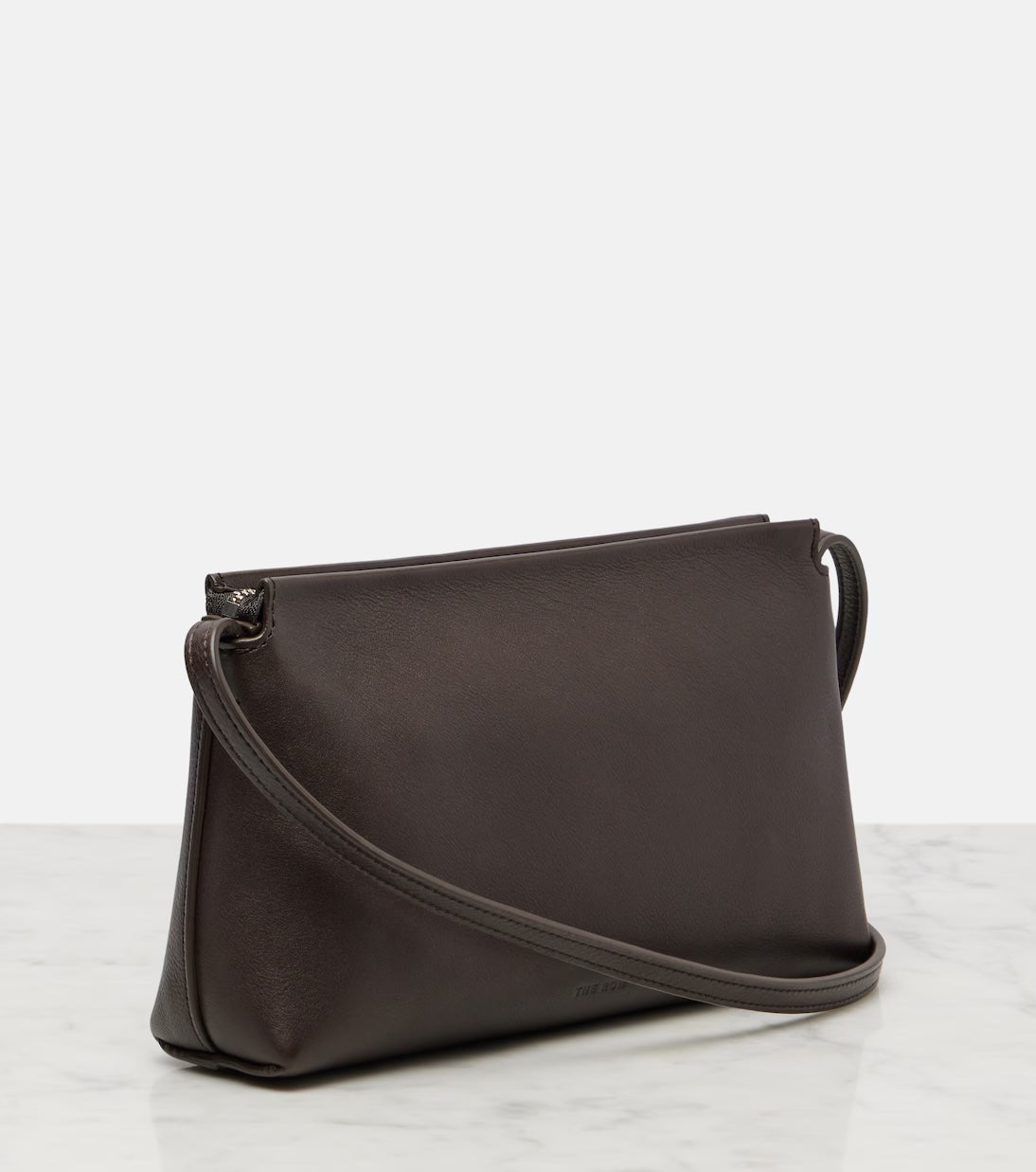 The Row Rene shoulder bag in brown, angle view — The Quiet Edition