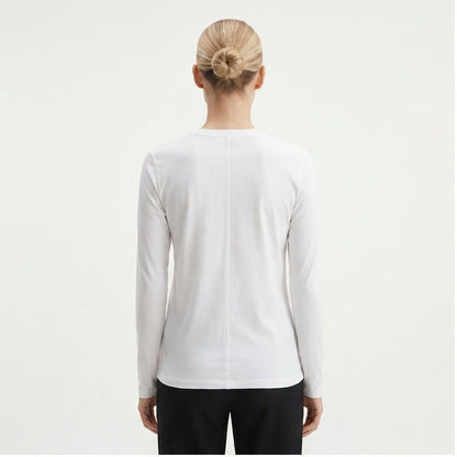 The Row Sherman long-sleeve t-shirt in white, back view on model — The Quiet Edition