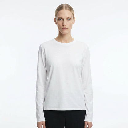 The Row Sherman long-sleeve t-shirt in white, front view on model — The Quiet Edition