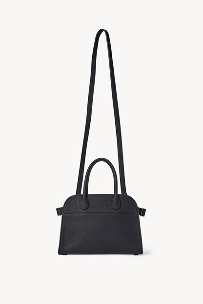 The Row Soft Margaux 10 Bag in Black, front view with shoulder strap — The Quiet Edition