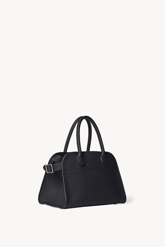 The Row Soft Margaux 10 Bag in Black, three-quarter angle view — The Quiet Edition