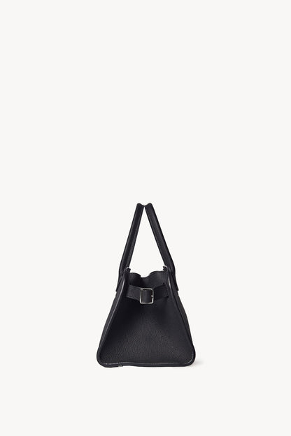 The Row Soft Margaux 10 Bag in Black, side view with buckled gusset — The Quiet Edition