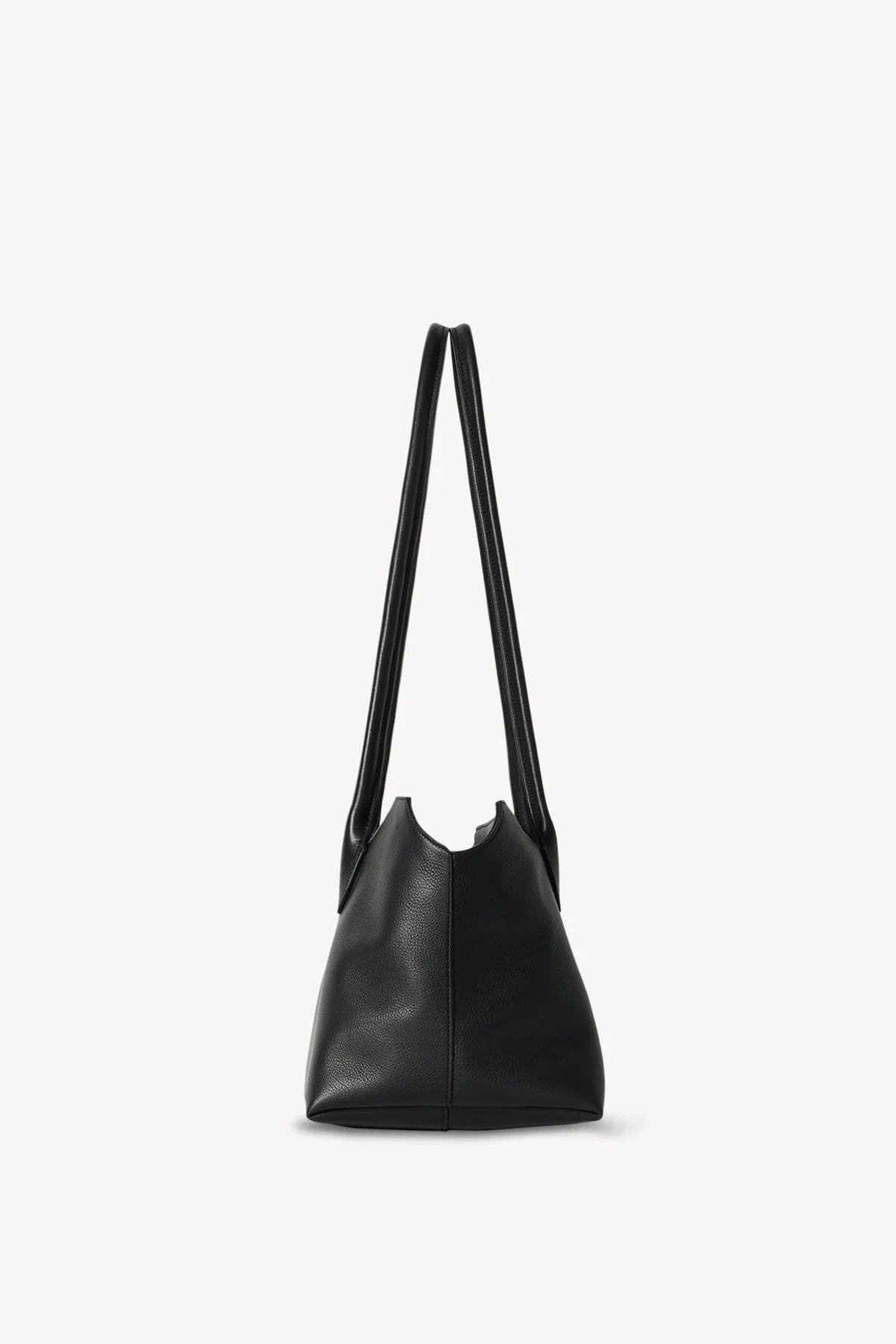 The Row Terrasse leather shoulder bag in black, side profile view — The Quiet Edition