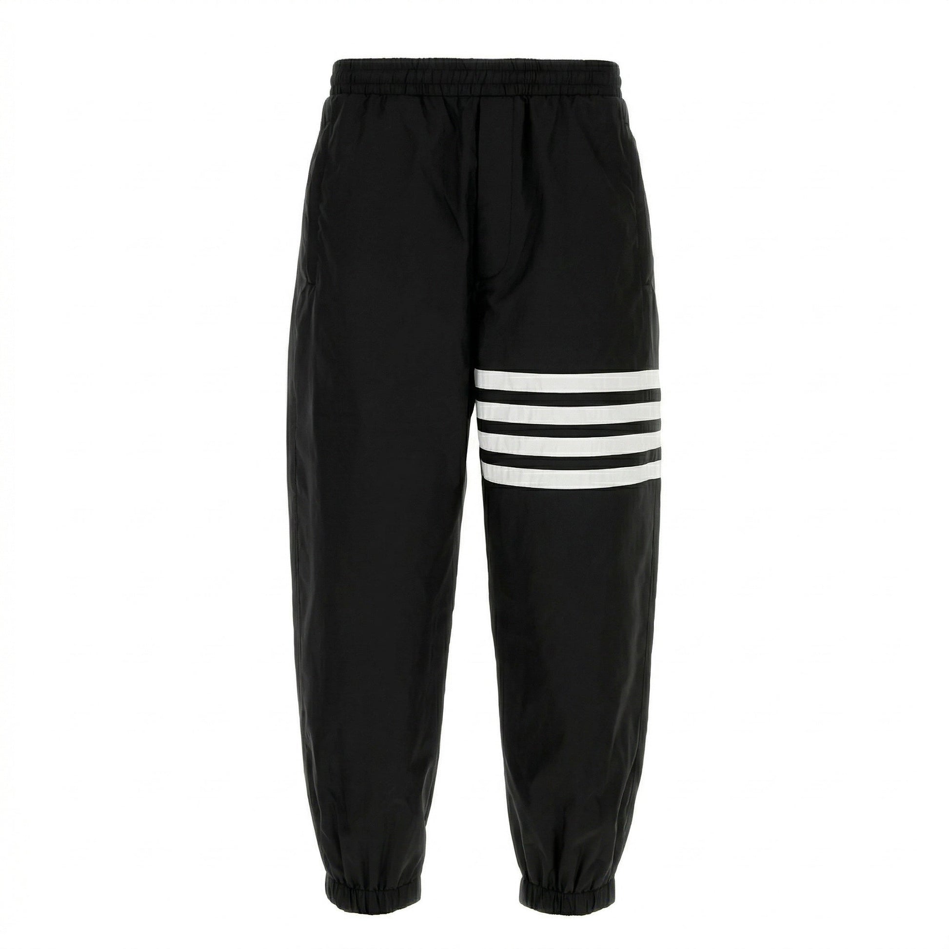 Thom Browne 4-Bar track pants in black, front view — The Quiet Edition