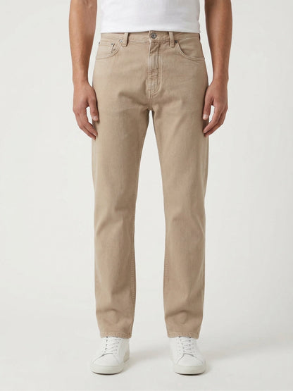 Z Zegna five-pocket cotton trousers in sand, on model front view — The Quiet Edition