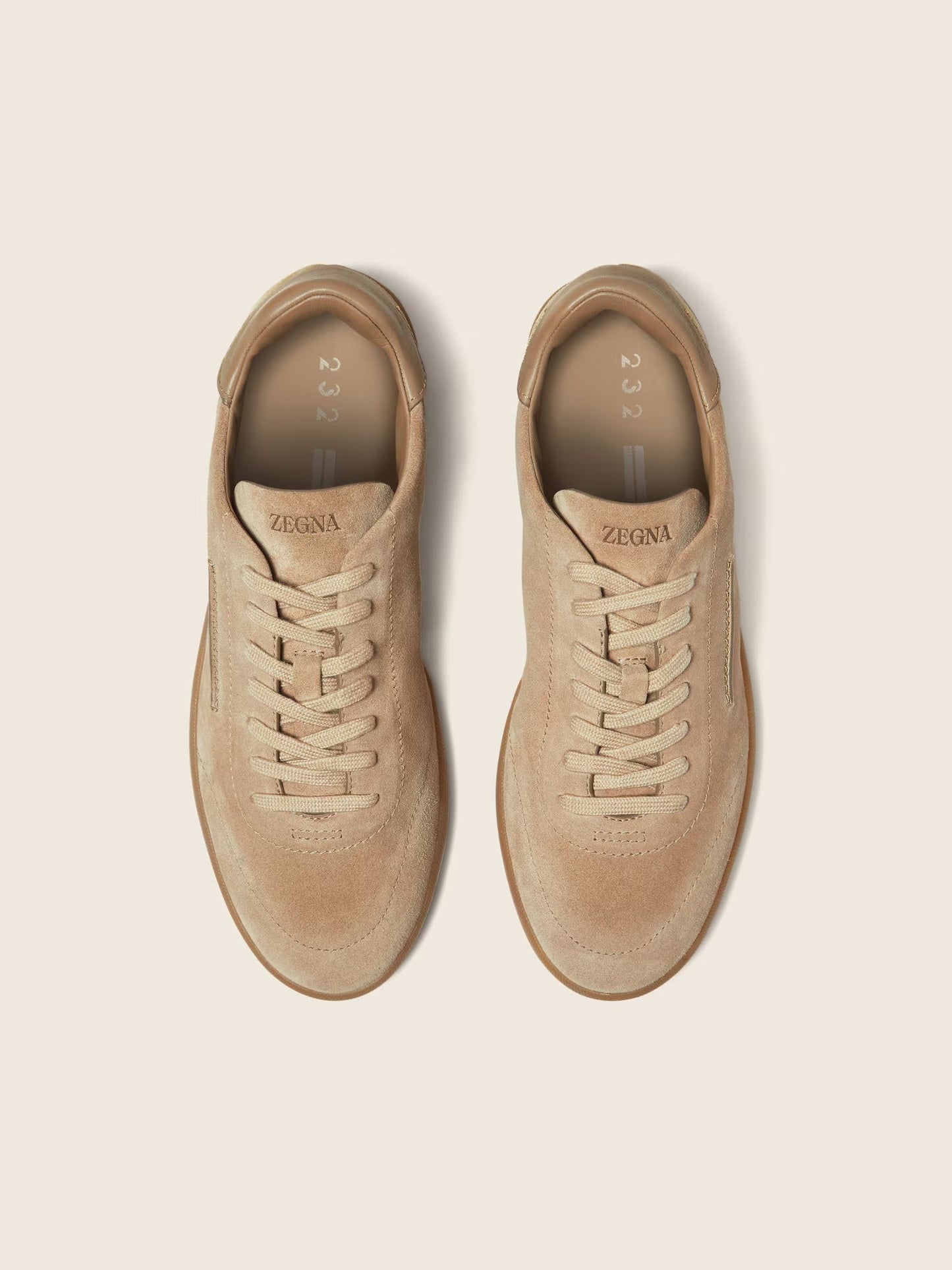 Zegna 232 suede sneaker in beige, front angle — The Quiet Edition