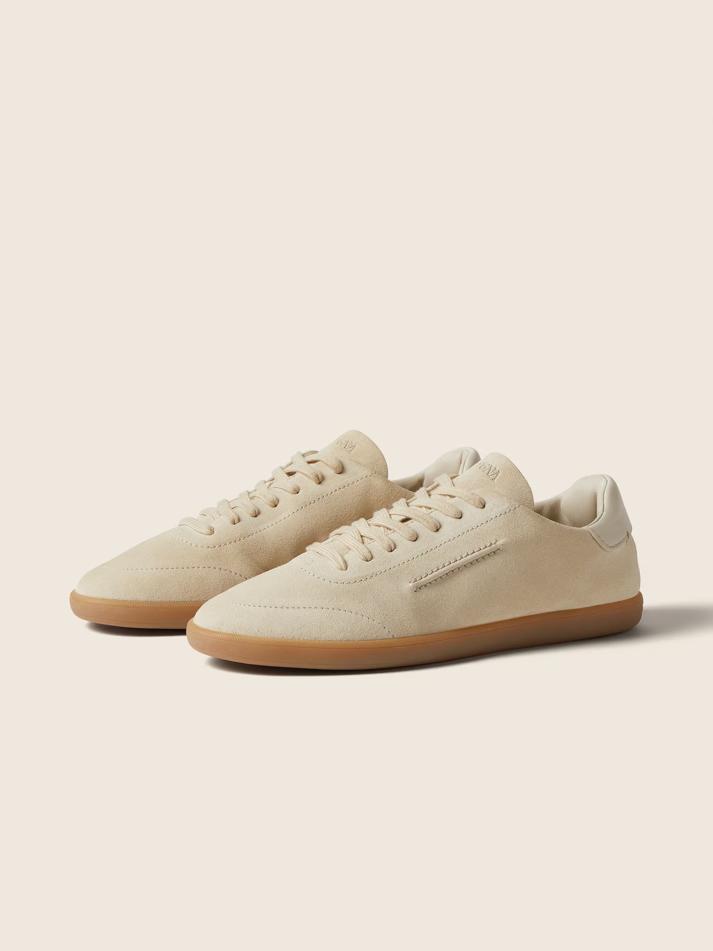 Zegna 232 suede sneaker in white, front angle — The Quiet Edition