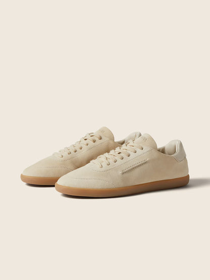 Zegna 232 suede sneaker in white, front angle — The Quiet Edition