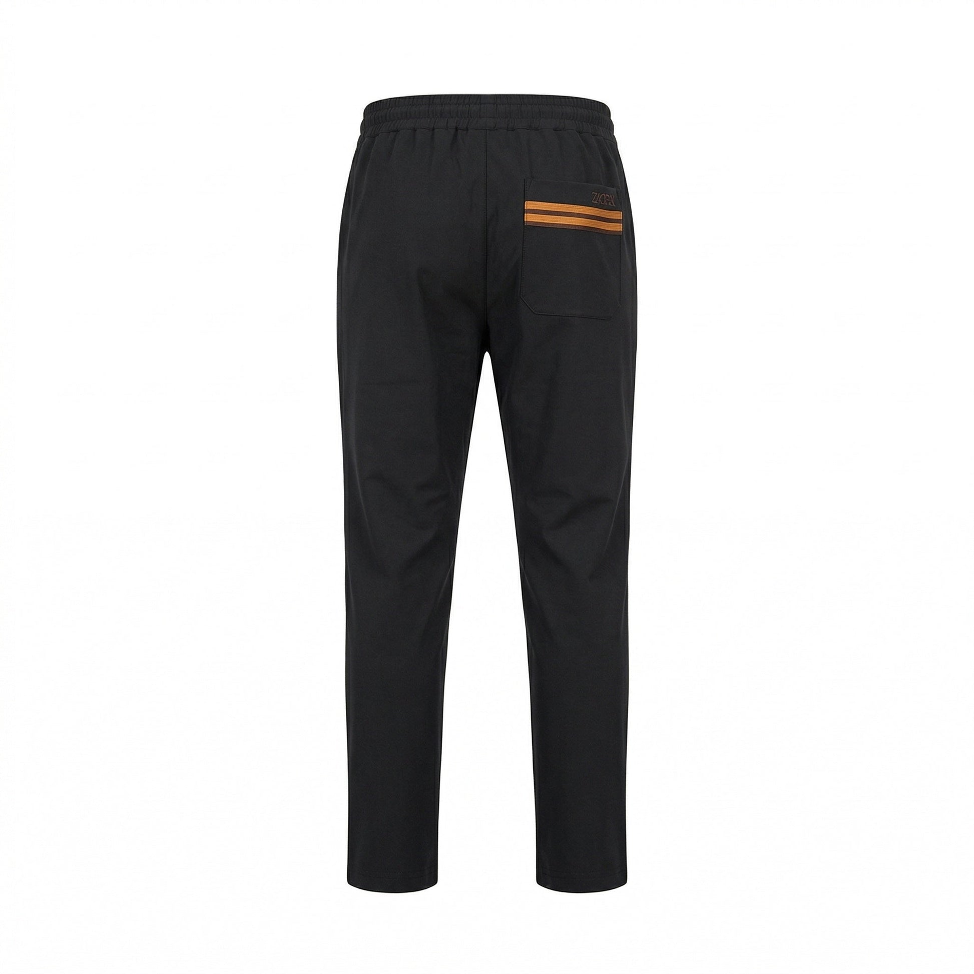 Zegna drawstring tapered trousers in black, back view — The Quiet Edition