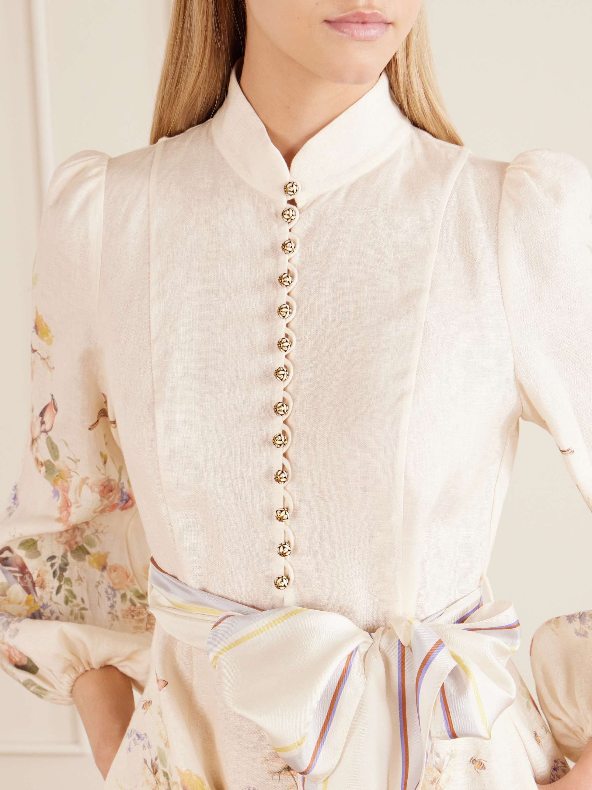 Zimmermann Valiant Belted Floral-Print Linen Mini Dress close-up of stand collar, gold buttons and silk bow belt